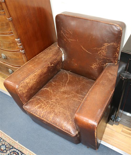 A pair of club armchairs